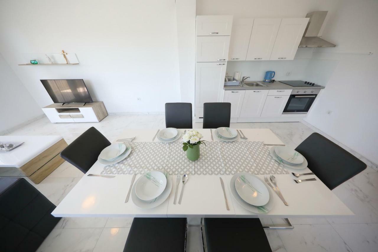 Apartmani Vlado Mitar ซูโกชัน ภายนอก รูปภาพ